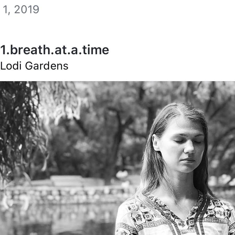 Aryana Apanaska meditating in lotus by the water