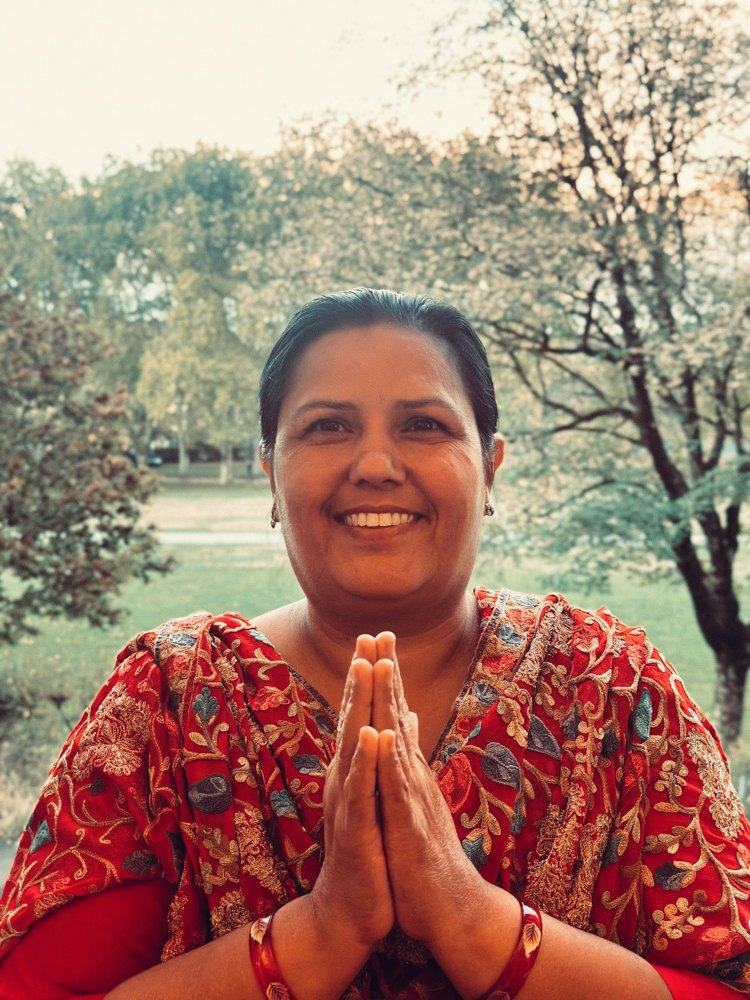 Parmeet Khatri smiling with hands in namaste